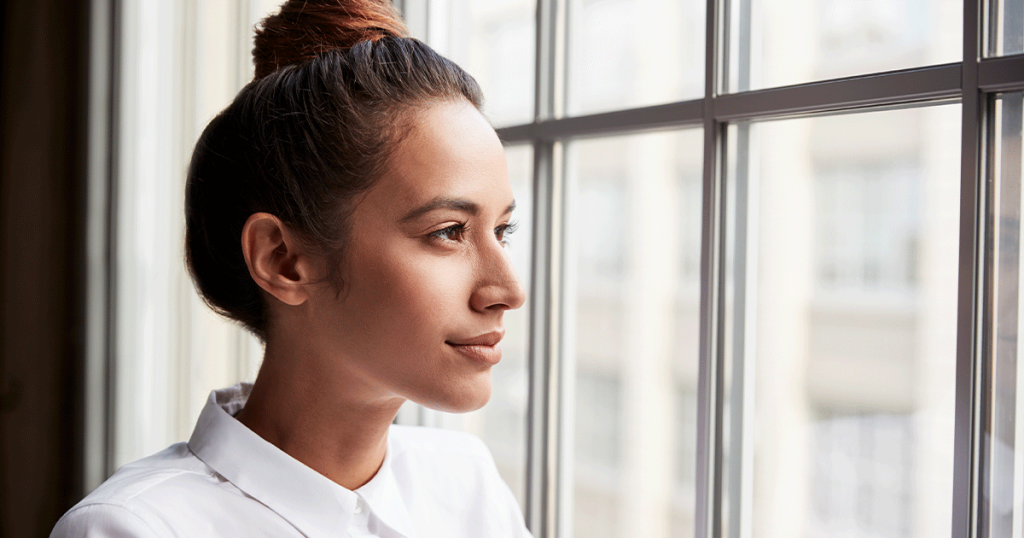 a young pregnant woman thinking about adoption as an option